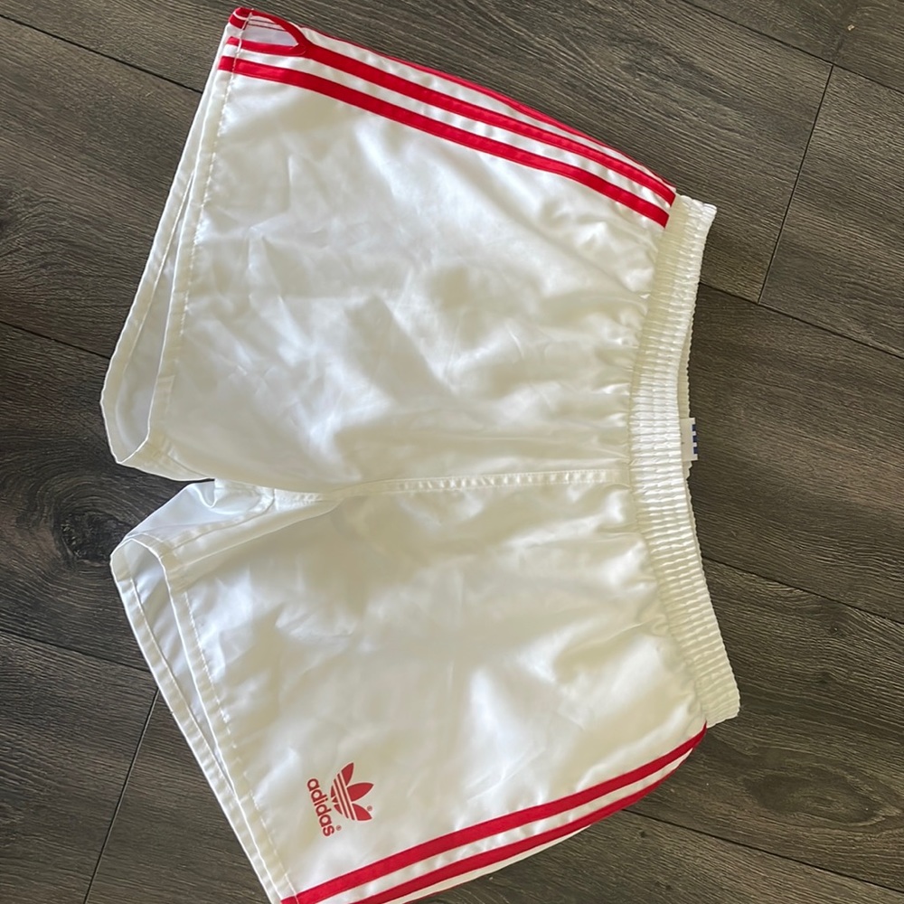 White and red adidas track shorts